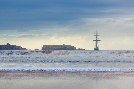 Beautiful atmosphere early evening at Tagharte Beach near Essaouira, Moroccoの写真素材