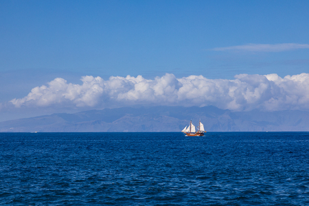View of La Gomera island from Puerto de Santiago, Tenerife, Canary Islands, Spainの写真素材