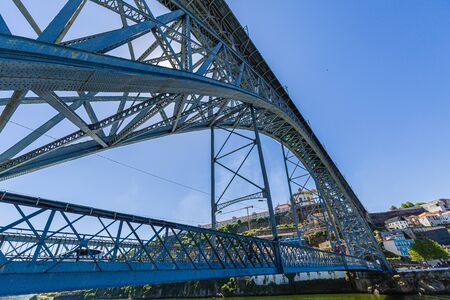 Iconic Dom LuÃ­s I Bridge above Douro river. Porto, Portugal