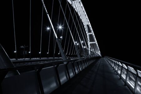 Night view of Apollo bridge over Danube river, Bratislava, Slovakia
