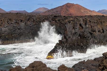 Cliffs of Los Hervideros on the island of Lanzarote, Canary Islands in the Atlantic Oceanの写真素材
