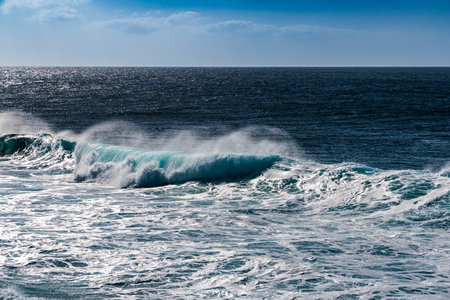 Surf waves of the ocean off the coast of the island of Lanzarote, Canary Islands, Spain