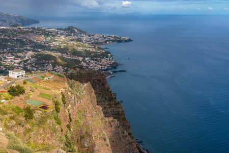 View of the ocean and coastline from the glass-floored lookout on Madeira Island, Portugalの写真素材