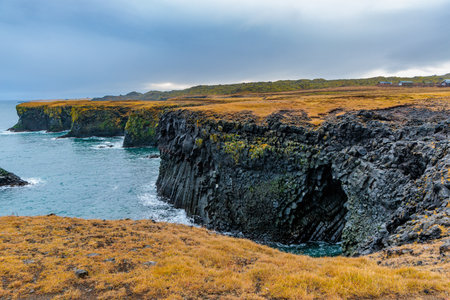 Cliffs on the coast of Arnarstapi on the island of Iceland in the North Atlanticの写真素材