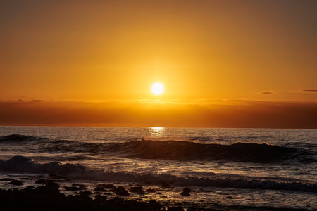 Sunset on the coast near El Turman on Gran Canaria, Canary Islands, Spainの写真素材