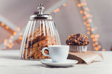 objects on sackcloth bank and cookies with nuts and chocolate cakeの写真素材