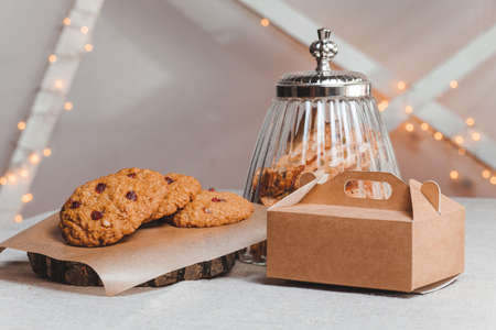 objects on sackcloth bank and cookies with nuts and cupcake with a spoonの写真素材