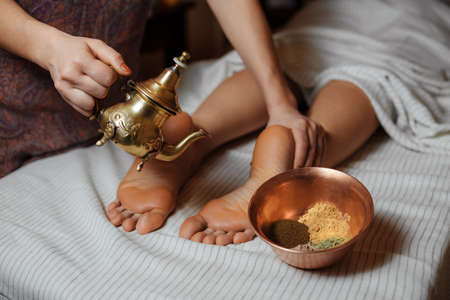 Spa aroma foot massage with oilの写真素材