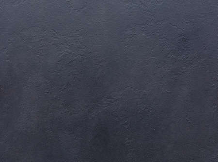 Old black background. Grunge texture. Dark wallpaper. Chalkboard Concreteの写真素材