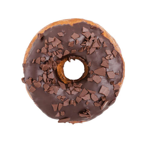 A single chocolate glazed donut with chocolate chips isolated white background top viewの写真素材