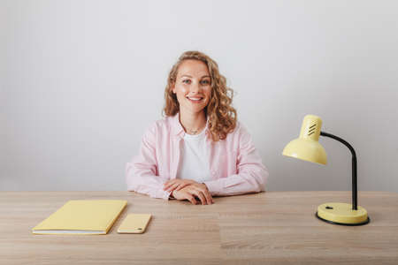 A young girl studies and works at homeの写真素材
