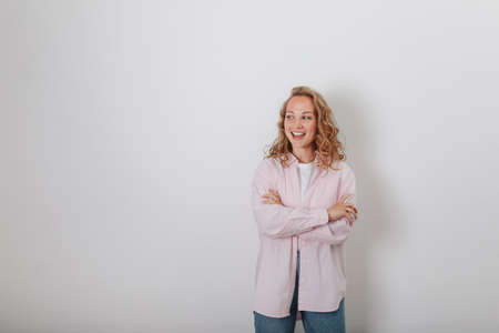 The girls in the white background thinkの写真素材