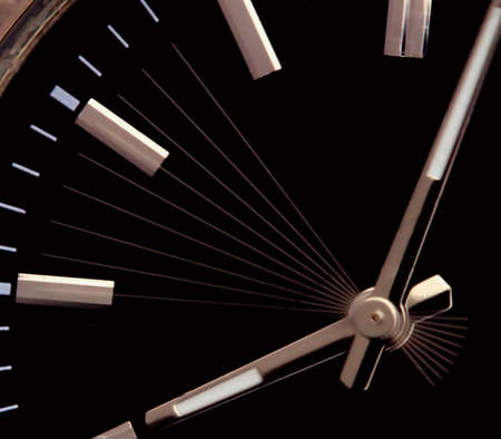 seconds ticking by on black watch dial