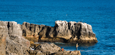 View over the coastal cliffs to the ocean, selective focus.