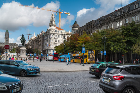 Porto, Portugal - 10/01/2019: Aliados Avenue with Porto City Hall at the top and  on the right;...