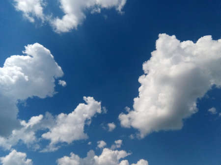 White ball clouds in the blue skyの写真素材