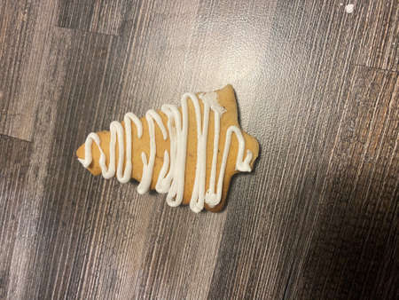 Christmas tree shaped biscuit with lemon glazeの写真素材