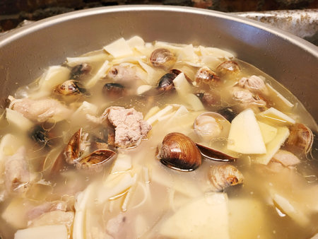 Bamboo shoots, clam and chicken soupの写真素材