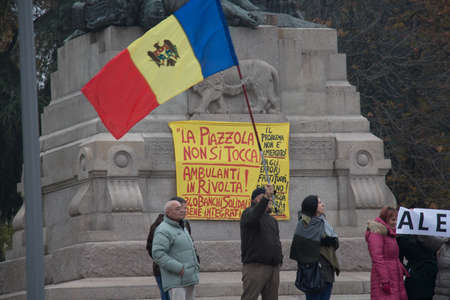 Italy, Bologna - November 20 2016: people protest against markets on a square on November 20 2016 in Bologna, Emilia Romagna , Italy.のeditorial素材
