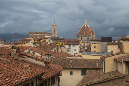 Italy, Florence - November 06 2016: view of red roofs, Florence Cathedral Dome, Giotto's Campanile on November 06 2015 in Florence Italy.のeditorial素材