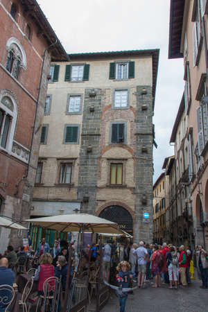 Italy Lucca - September 18 2016: the view of open air cafe and people on Lucca's street on September 18 2016 in Lucca Tuscany Italy.のeditorial素材