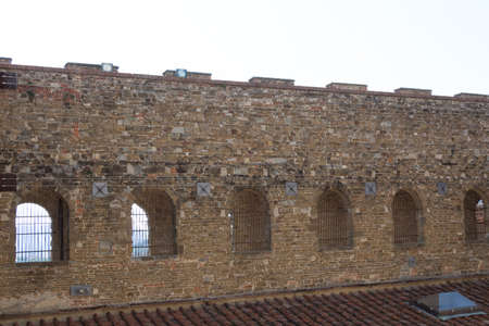 Italy, Florence - May 18 2017: detailed view of a brick wall in Palazzo Vecchio on May 18 2017 in Florence, Tuscany, Italy.のeditorial素材