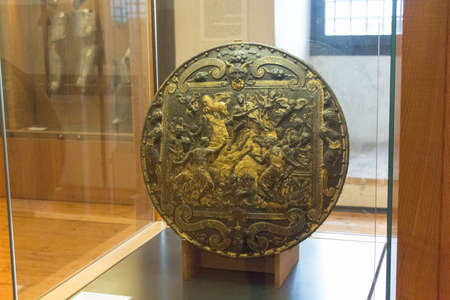 Italy, Brescia -December 31 2017: La rotella da pompa is a circular shields used in the sixteenth century in Luigi Marzoli Arms Museum on December 31 2017, Lombardy, Italy.のeditorial素材