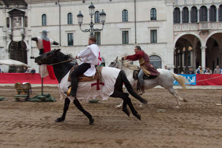 Italy, Brescia - October 01 2017: the view of the traditional knight tournament at celebrations of Caterina Cornaro is coming to the city, medieval festival in Brescia on October 01 2017, Lombardy, Italy.のeditorial素材