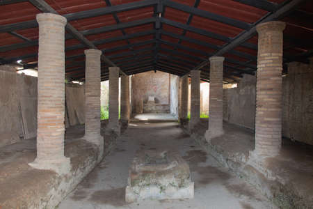 Italy, Ostia - April 16 2017: the view of The Shrine of the Three Naves in The Ancient Roman Port of Ostia Antica on April 16 2017, Lazio, Italy.のeditorial素材