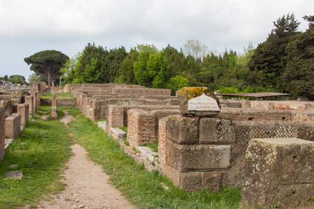 Italy, Ostia - April 16 2017: the view of ruins, Via dei Magazzini Repubblicani in Ostia Antica on April 16 2017, Lazio, Italy.のeditorial素材
