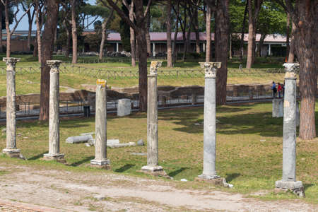 Italy, Ostia - April 16 2017: the view of the columns on Piazzale delle Corporazioni in The Ancient Roman Port of Ostia Antica on April 16 2017, Lazio, Italy.のeditorial素材