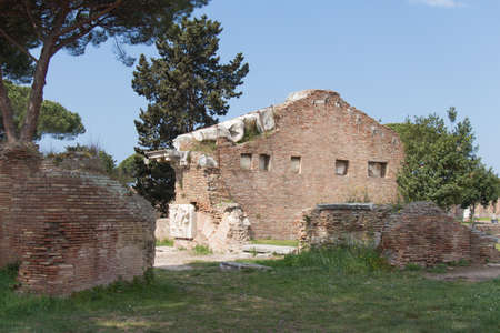 Italy, Ostia - April 16 2017: the front view of Rome and August Temple in The Ancient Roman Port of Ostia Antica on April 16 2017, Lazio, Italy.のeditorial素材