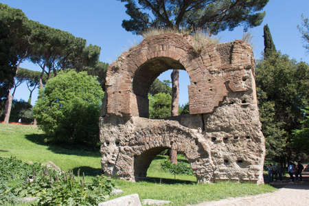 Italy, Rome - April 17 2017: the view of the Aqua Claudia aqueduct ruins of Roman Forum on April 17 2017, Lazio, Italy.のeditorial素材