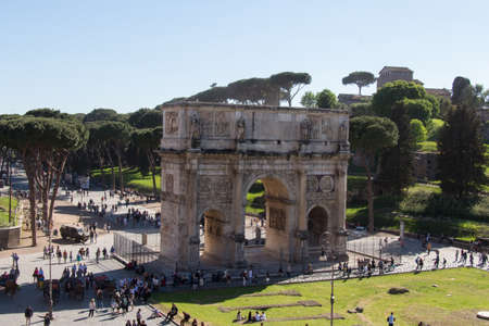 Italy, Rome - April 17 2017: the view of Arch of Constantine next to Coliseum on April 17 2017, Lazio, Italy.のeditorial素材