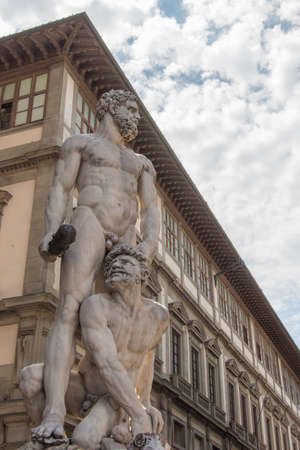 Italy, Florence - May 18 2017: the view of white sculpture Hercules and Cacus at the entrance of the Palazzo Vecchio in the Piazza della Signoria on May 18 2017 in Florence, Tuscany, Italy.のeditorial素材
