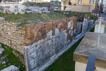 Italy, Brescia - December 24 2017: the view ruins of Foro Romano of Capitolium, Ancient Roman temple, UNESCO World Heritage Site on December 24 2017 in Brescia, Lombardy, Italy.のeditorial素材