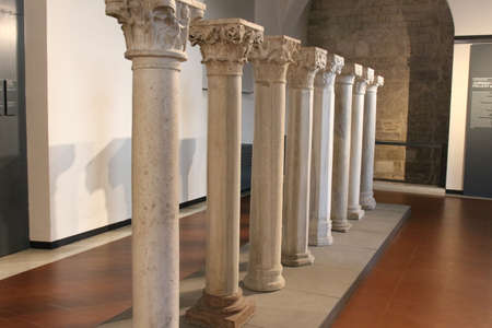 Italy, Brescia - December 24 2017: the view of Pillars representing architecture and decoration XI - XV centuries in Santa Giulia museum on December 24 2017 in Brescia, Lombardy, Italy.のeditorial素材