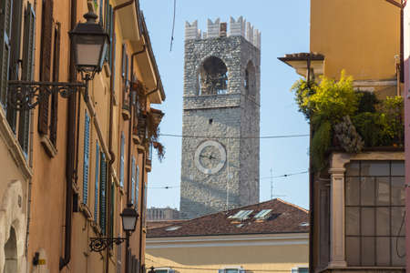 Italy, Brescia - December 24 2017: the back view of the Tower of Pegol, or Tower of the people or Market Tower, on December 24 2017 in Brescia, Lombardy, Italy.のeditorial素材