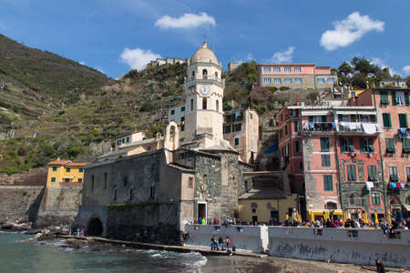 Vernazza, Italy - April 2 2018: the view of the church of Santa Margherita d'Antiochia in Vernazza in the National Park of Cinque Terre on April 2 2018 in Liguria Italy.のeditorial素材