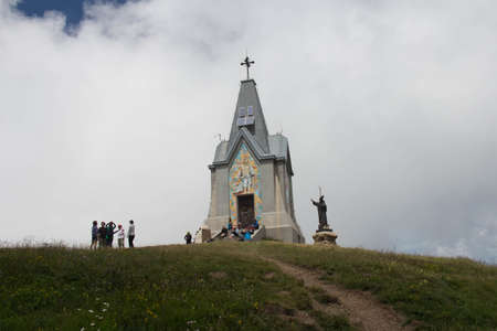 Italy, Lombardy - July 22 2018: the view of monument to the Redeemer and the statue of Papa Paolo VI at Monte Guglielmo on July 22 2018 in Italy.のeditorial素材