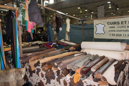 Italy, Piacenza - March 24 2018: the view of leather stall at annual medieval market in Piacenza on...