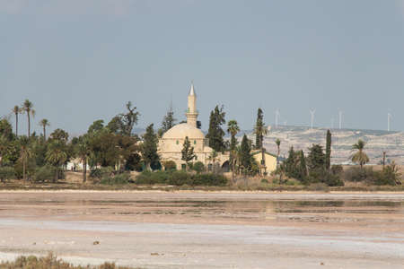 Larnaca, Cyprus - October 16 2019: the view of Hala Sultan Tekke and salt lake in a sunny day on October 16 2019 in Larnaca, Cyprus.のeditorial素材