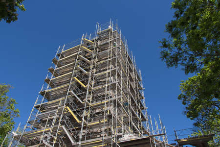Sweden, Sigtuna - May 31 2019: the view of under construction building with clear blue sky on background on May 31 2019 in Sigtuna, Sweden.のeditorial素材