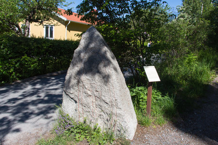 Sweden, Sigtuna - May 31 2019: the view of an ancient rune stone on May 31 2019 in Sigtuna, Sweden.のeditorial素材