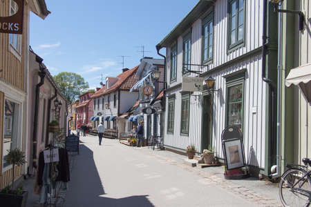 Sweden, Sigtuna - May 31 2019: the view of a Stora gatan in a sunny day, the old main street on May 31 2019 in Sigtuna, Sweden.のeditorial素材