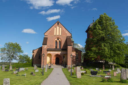 Sweden, Sigtuna - May 31 2019: exterior view of Skokloster church in a sunny day on May 31 2019 in Sigtuna, Sweden.のeditorial素材