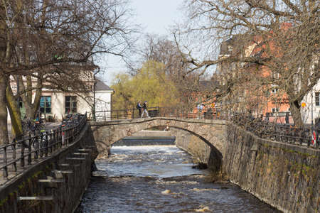 Sweden, Uppsala - April 19 2019: the view of a bridge on a canal on April 19 2019 in Uppsala,...