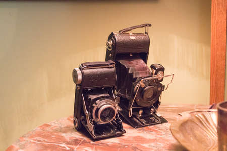 Kaliningrad, Russia - July 31 2019: interior view of Altes Haus Museum, two vintage photo cameras on a table on July 31 2019 in Kaliningrad, Russia.のeditorial素材
