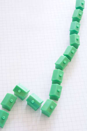 Graph showing growth curve in housing market against white backgroundの写真素材