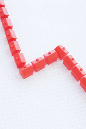 Graph showing decline in housing market against white backgroundの写真素材